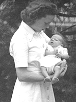 Bill in mom's arms